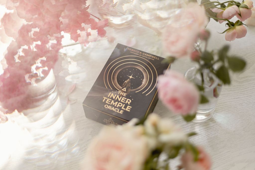 The Inner Temple Oracle surrounded by flowers