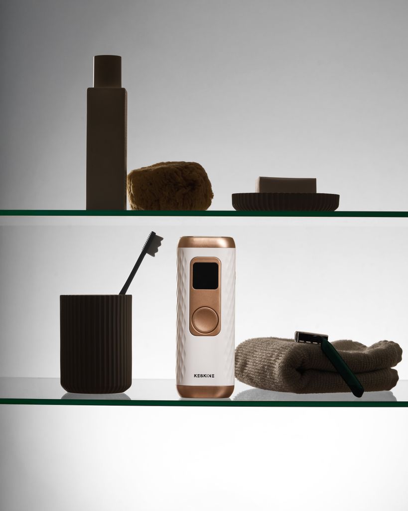 Keskine IPL handset on bathroom shelf 