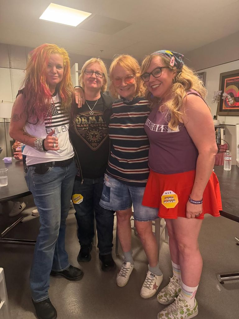 Pauley Perrette and Kirsten Vangsness pose for a photo with the Indigo Girls at one of their concerts, shared on Instagram