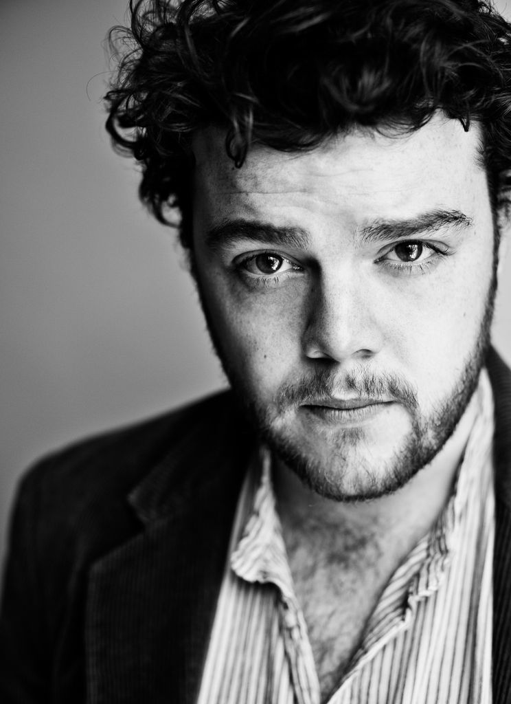 black and white headshot of male actor
