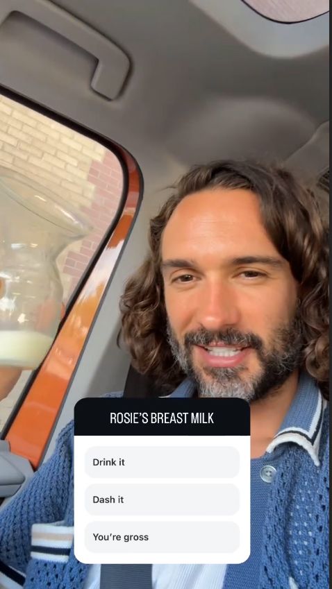 Joe Wicks holding up breast milk in the car