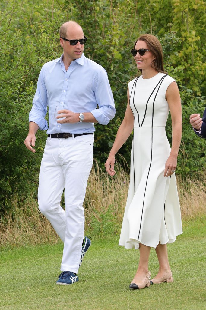 WINDSOR, ENGLAND - JULY 06: Prince William, Duke of Cambridge and Catherine, Duchess of Cambridge arrive for the Royal Charity Polo Cup 2022 at Guards Polo Club  during the Outsourcing Inc. Royal Polo Cup at Guards Polo Club, Flemish Farm on July 06, 2022