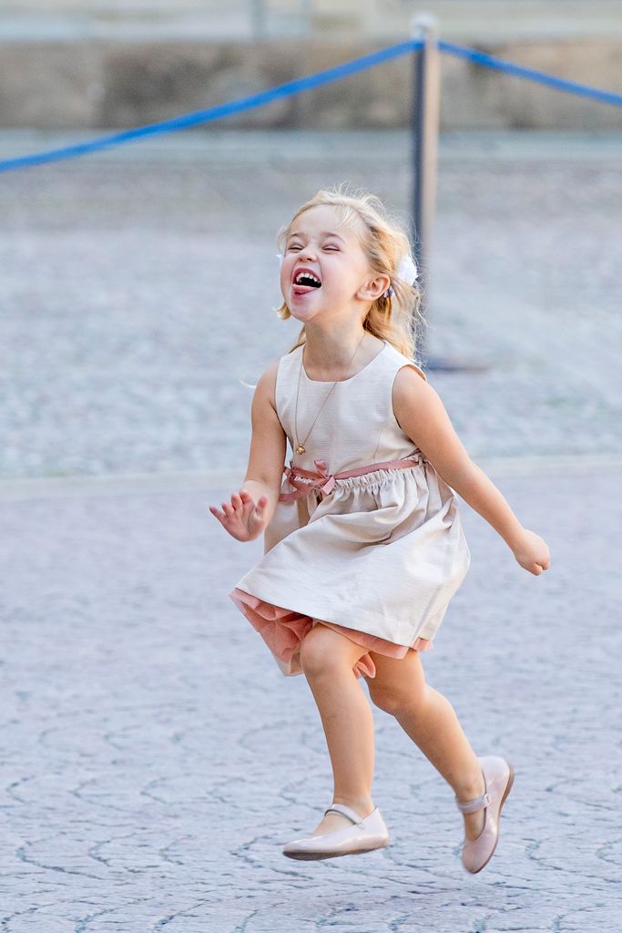 Princess Leonore running in white dress