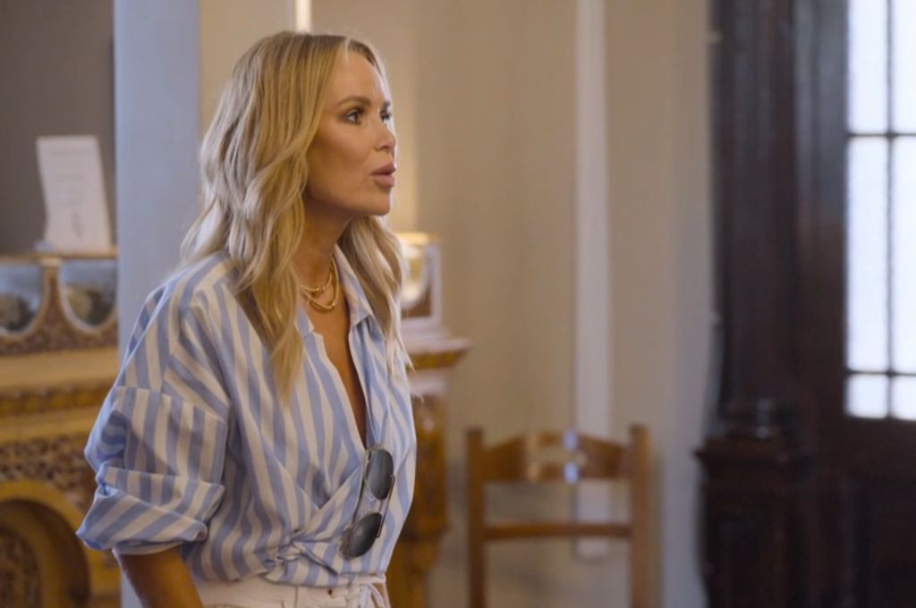 amanda holden wearing a striped shirt with a white denim skirt