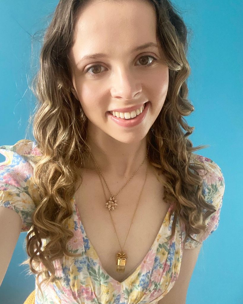 selfie of a young woman with curled hair