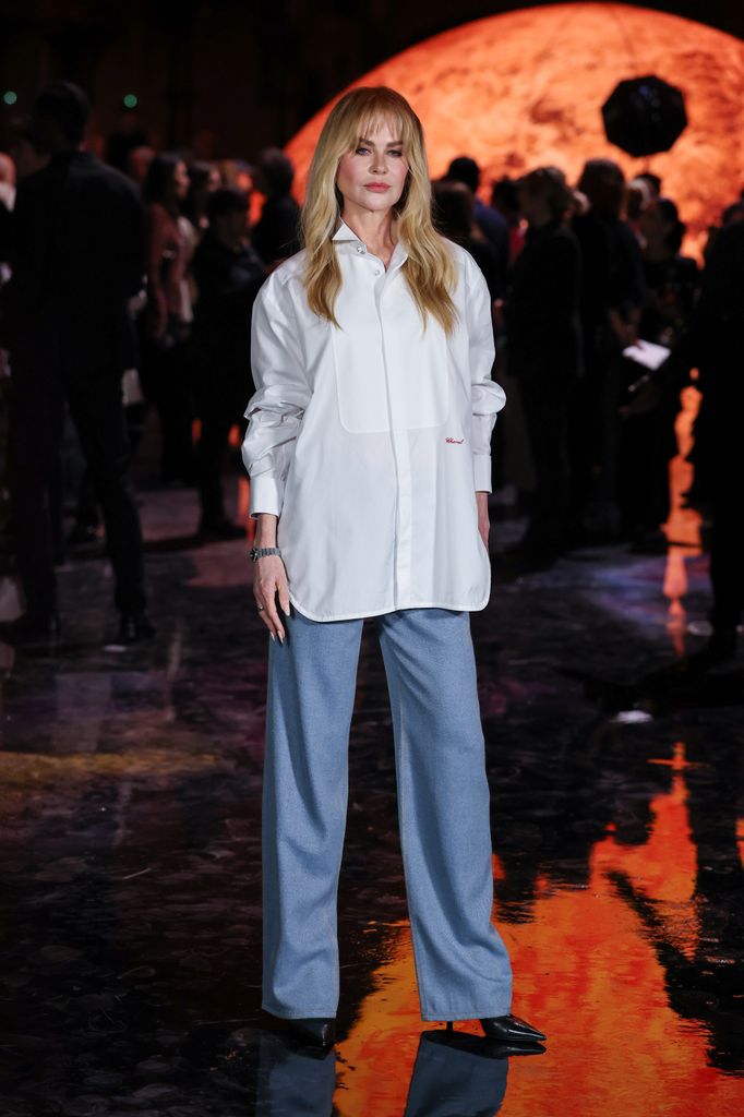photo of nicole kidman in white shirt with bangs at chanel pfw