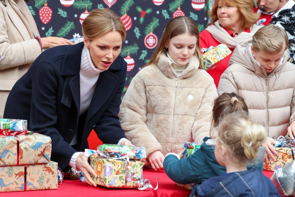 Princess Charlene handing out Christmas gifts