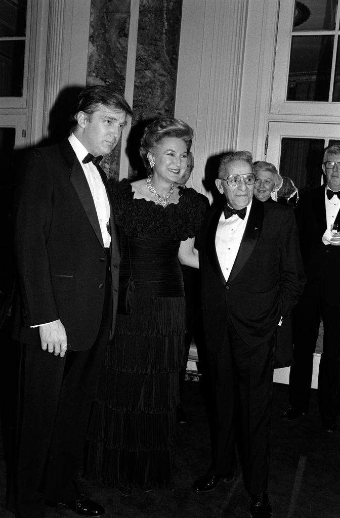 Donald J. Trump (L), Maryanne Barry Trump (C), and guests attend an event at the Waldorf Astoria Hotel in New York City 