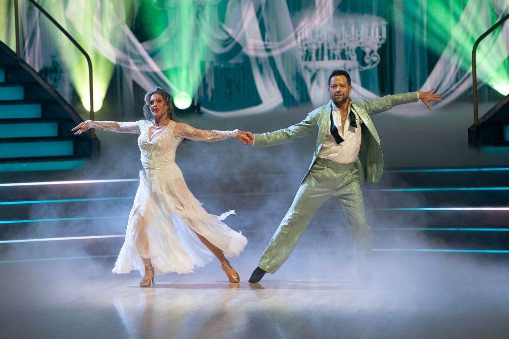 Danielle Fishel and Pasha Pashkov perform during Halloween Night on DWTS