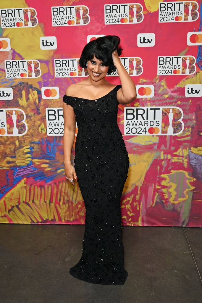 Raye attends The BRIT Awards 2024