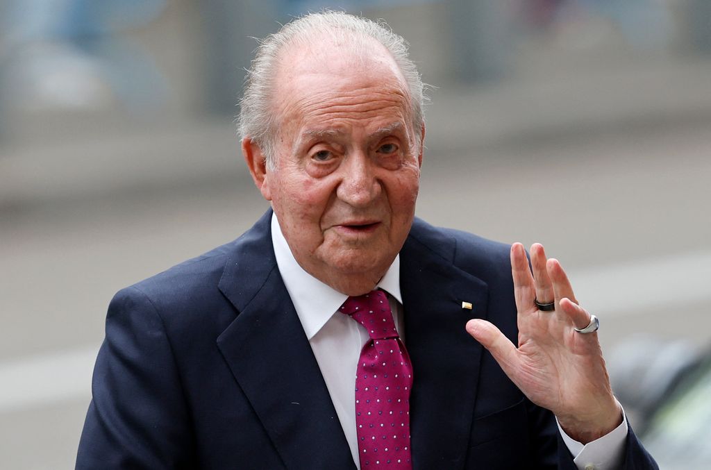 King Juan Carlos waving