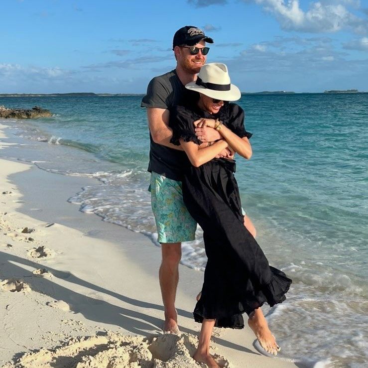 Prince Harry and Meghan Markle pose for picture on the beach 