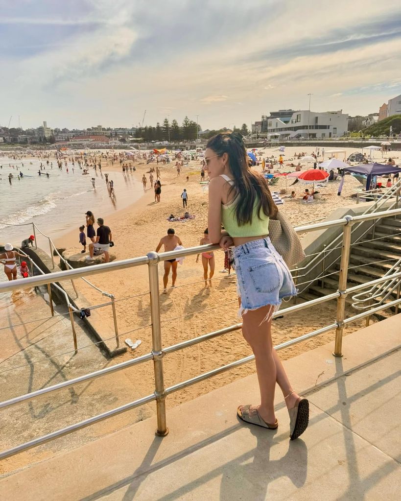 Michelle Keegan on Bondi Beach in shorts