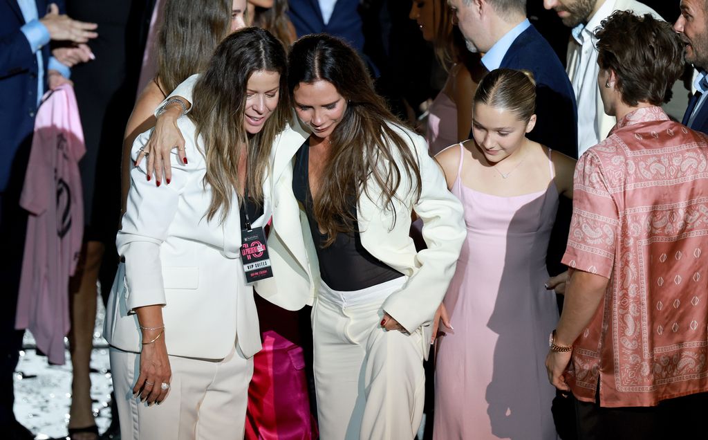 Aleyda Mas, Victoria Beckham, Harper Beckham  walk through crowd