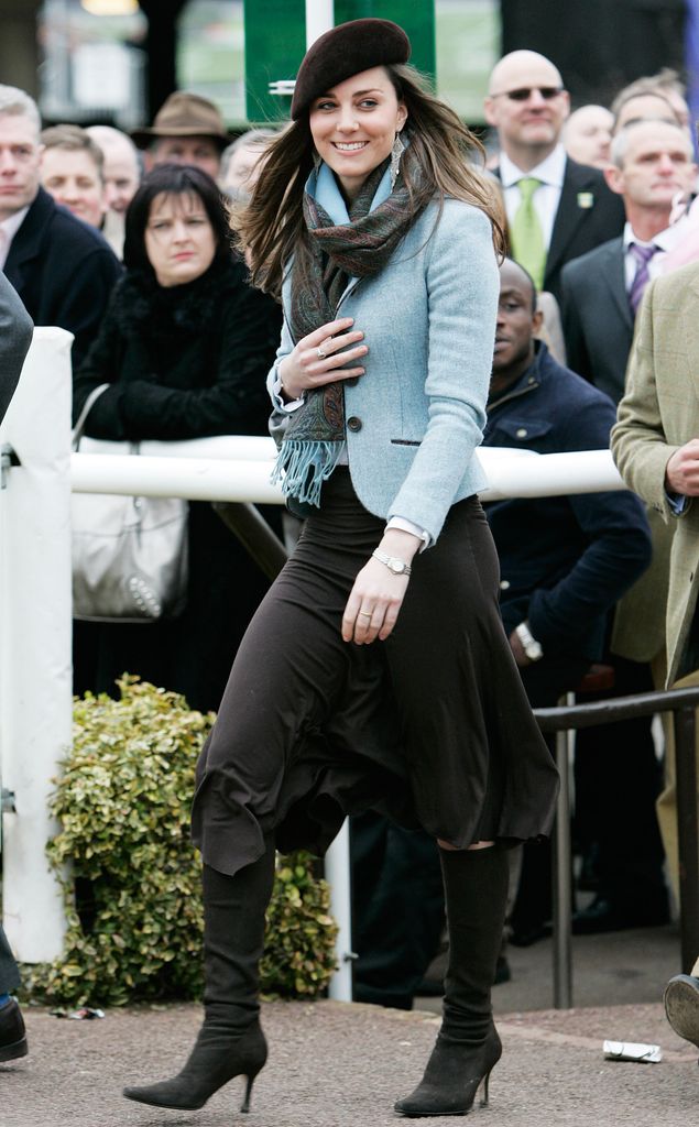 Kate Middleton wearing blue jacket, brown skirt and beret at Cheltenham