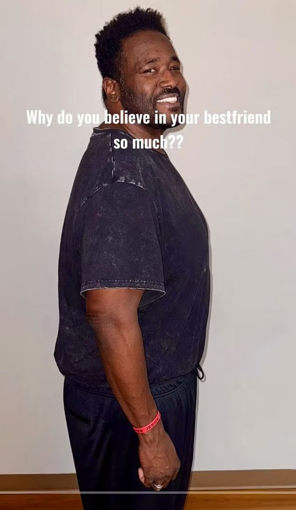 photo of quinton aaron standing side on showing off weight loss