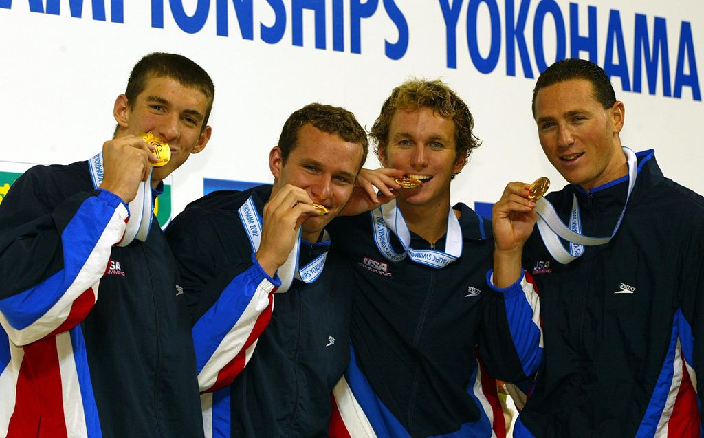 Michael Phelps, Brendan Hansen, Aaron Peirsol, and Jason Lezak of the USA celebrate their Gold Medal 