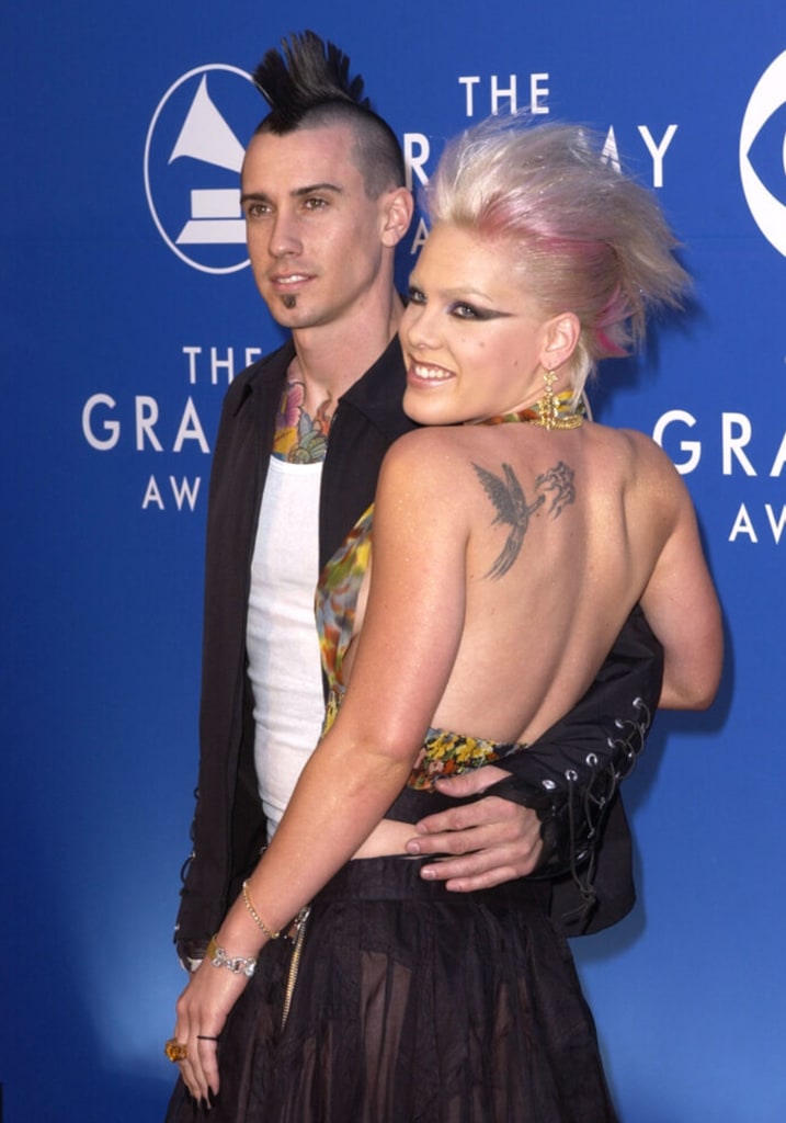 Carey with his arms around Pink