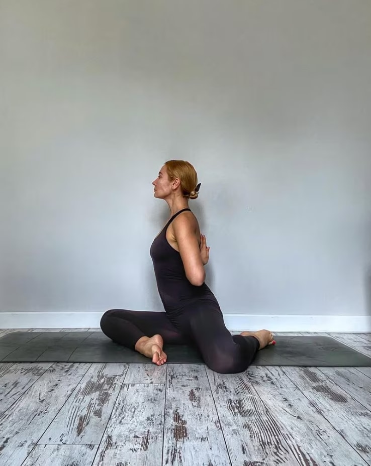 Deer pose, or Mrigasana yoga pose.