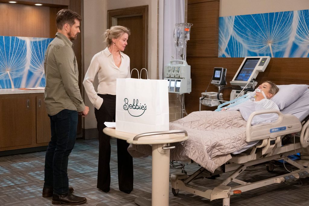 Cody, Felicia look over Maxie as she lies in a hospital bed in General Hospital 