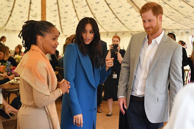 prince harry and meghan with doria inside tent