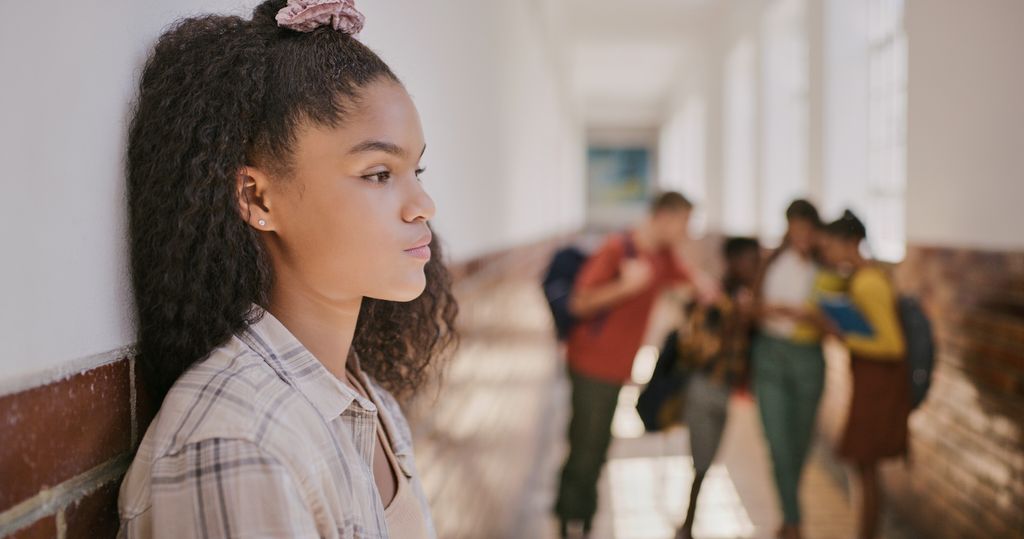 young girl left out by friends