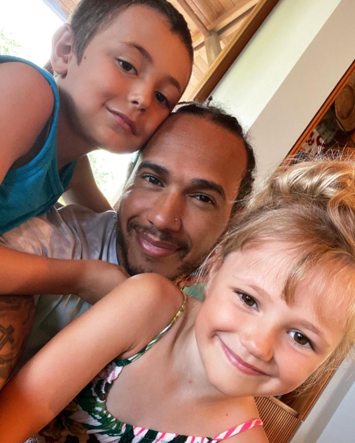 Lewis Hamilton with his niece and nephew