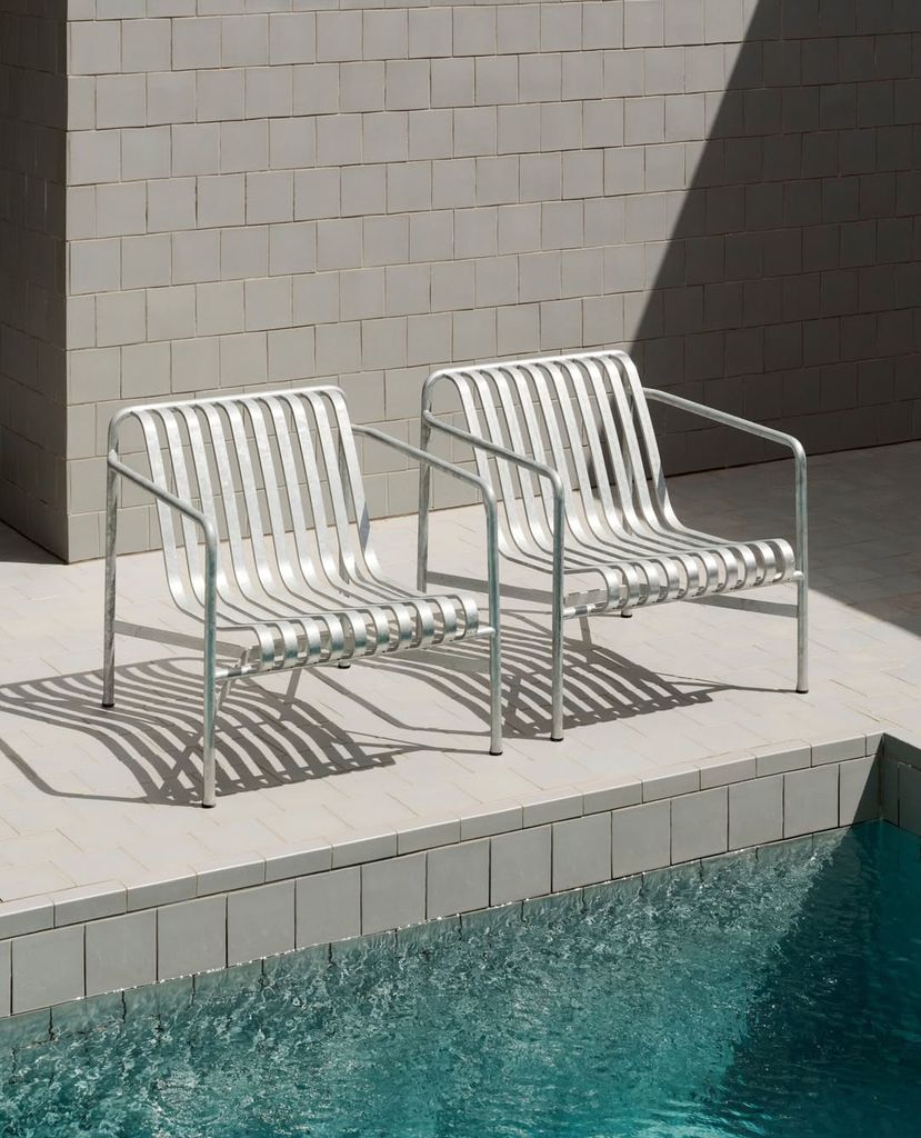 two silver chains by a pool