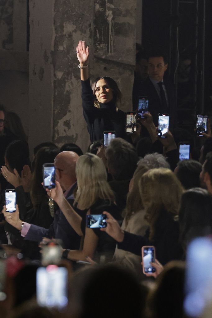 British fashion designer Victoria Beckham greets the audience at the end of her collection show for the Womenswear Ready-to-wear Fall-Winter 2025/2026 collection as part of the Paris Fashion Week, in Paris on March 7, 2025.