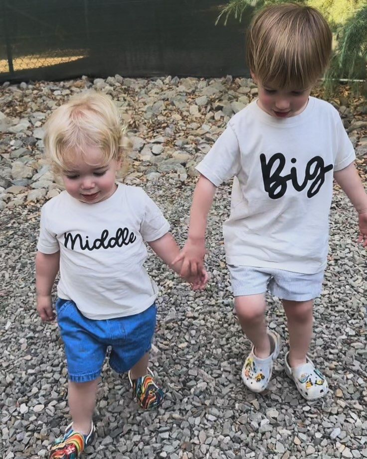 Mandy Moore reveals she is expecting third baby with picture of her two sons wearing tees that say "Big" and "middle"