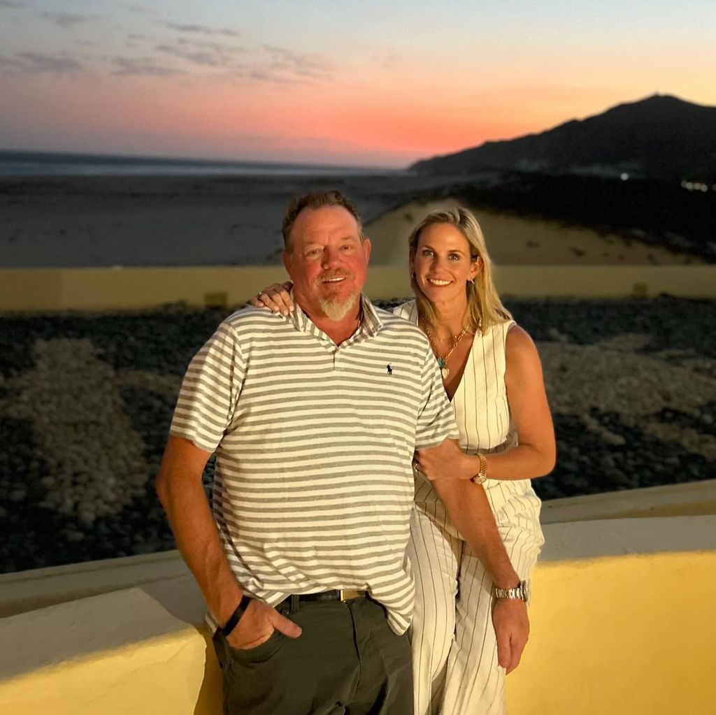 photo of pat green and wife kori by a sunset