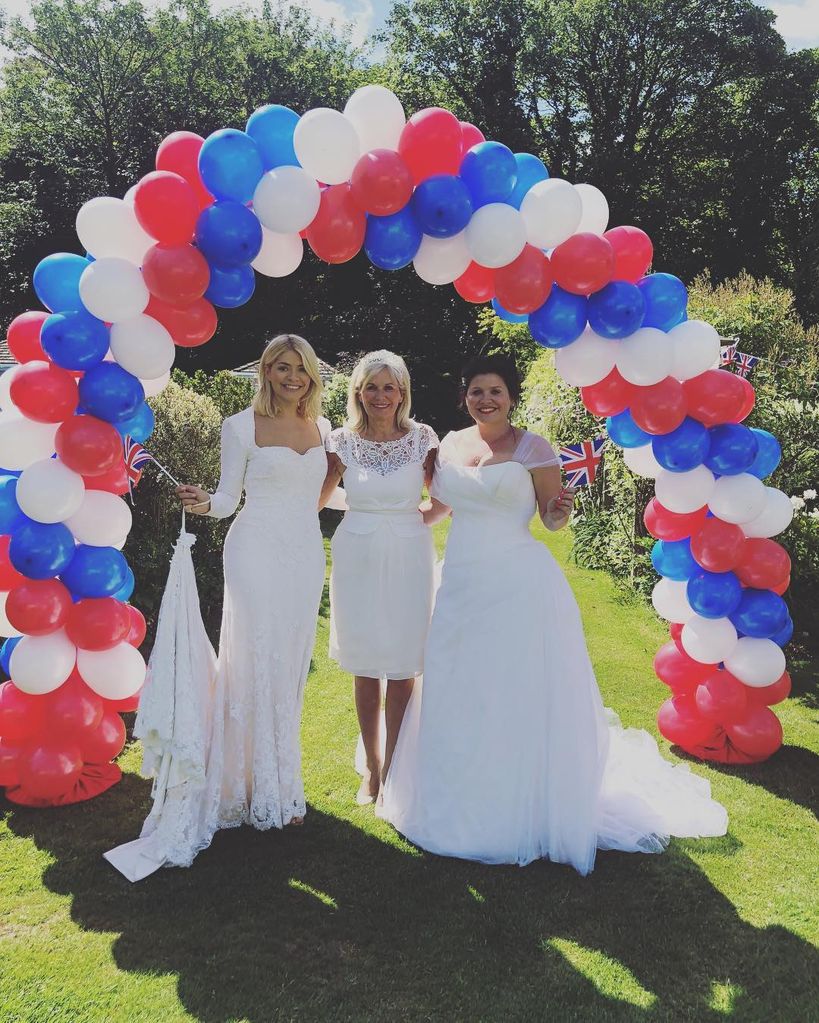 Holly Willoughby in her wedding dress with her mum in the garden