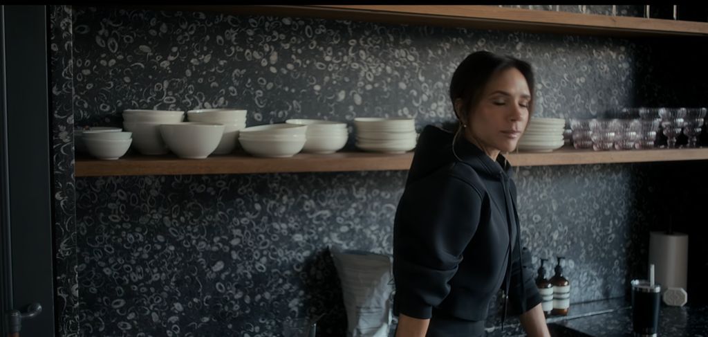 Victoria Beckham black gym hoodie in Netflix documentary