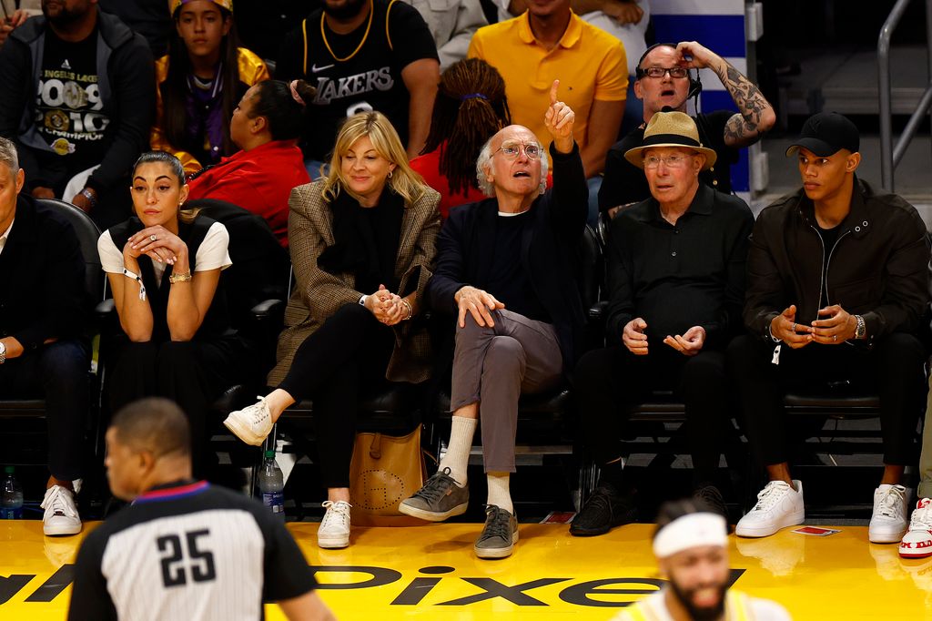 Ashley Underwood, Larry David, David Geffen and Donovan Michaels attend a game between the Memphis Grizzlies and the Los Angeles Lakers in the first half in Game Six of the Western Conference First Round Playoffs at Crypto.com Arena on April 28, 2023 in Los Angeles, California