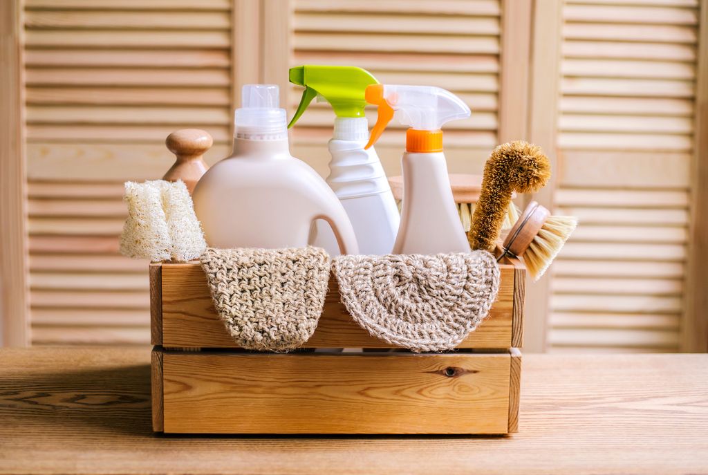 cleaning products in wooden basket