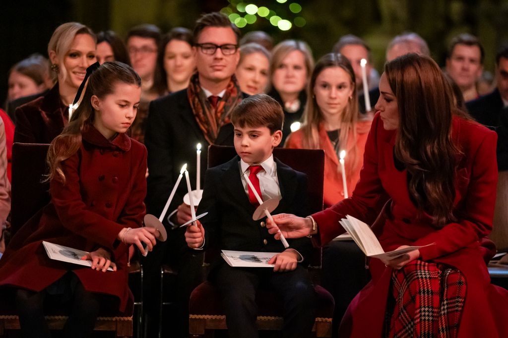 Princess Charlotte, Prince Louis and Catherine, Princess of Wales during the 'Together At Christmas' Carol Service