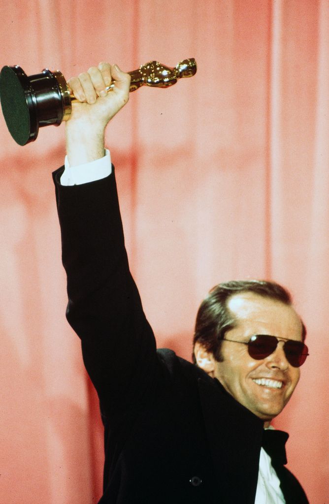 Actor Jack Nicholson pose backstage after winning "Best Actor" and "Best Actress" for "One Flew Over the Cuckoo's Nest" during the 48th Academy Awards at Dorothy Chandler Pavilion in Los Angeles,California.