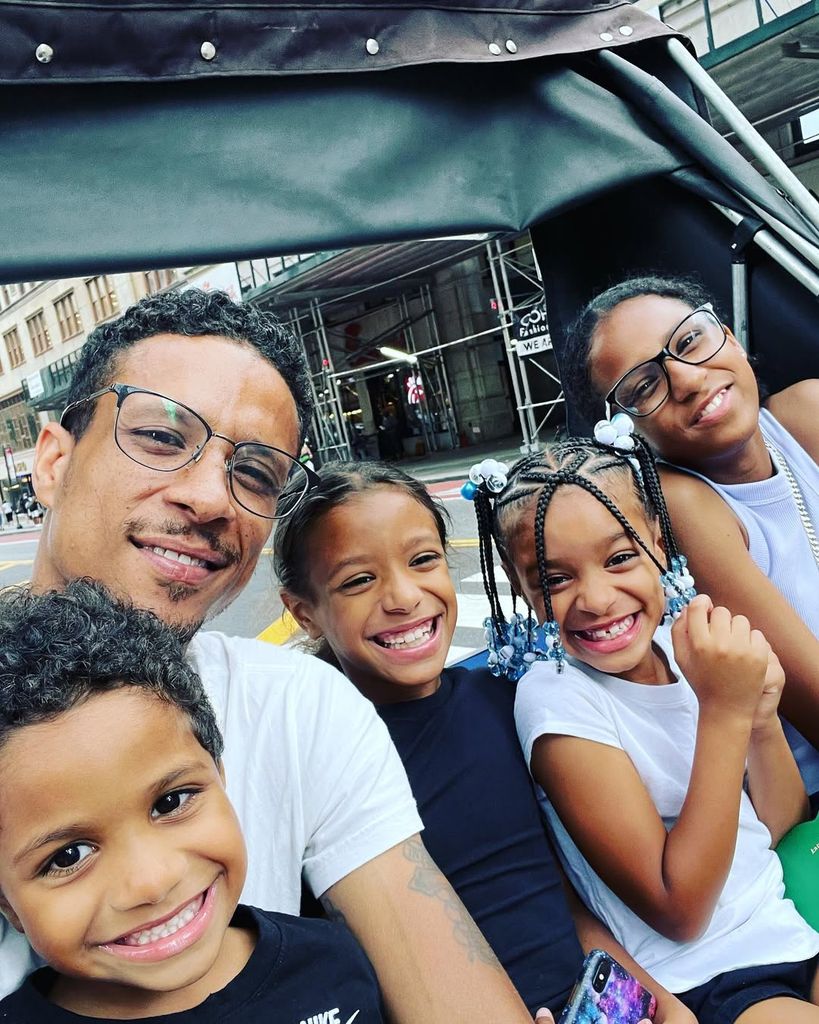 Floyd Roger Myers Jr. with his four children posing for a selfie in a carriage, shared on Instagram