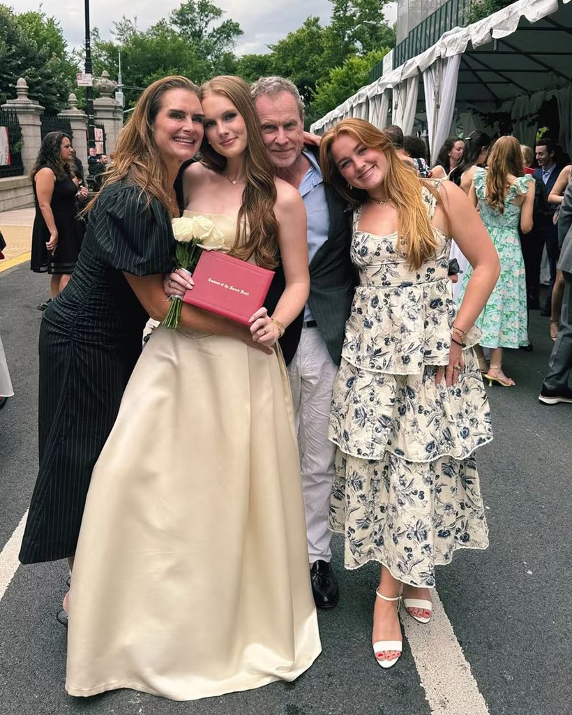 Grier wears her mother's wedding dress on her graduation day