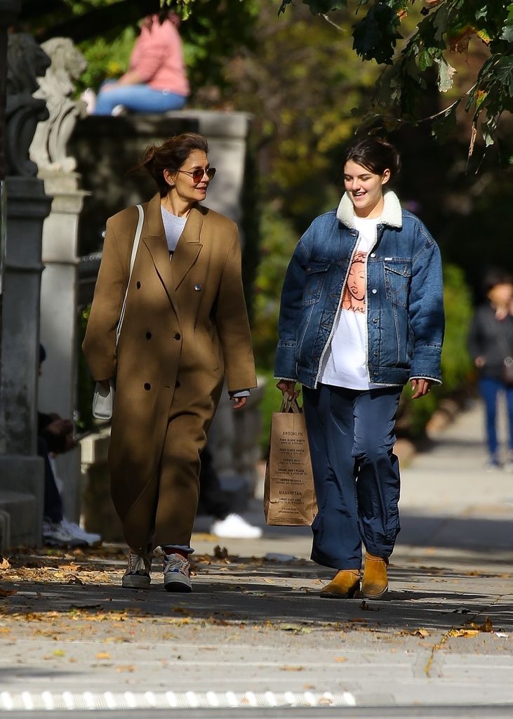 Suri and Katie are all smiles in NY