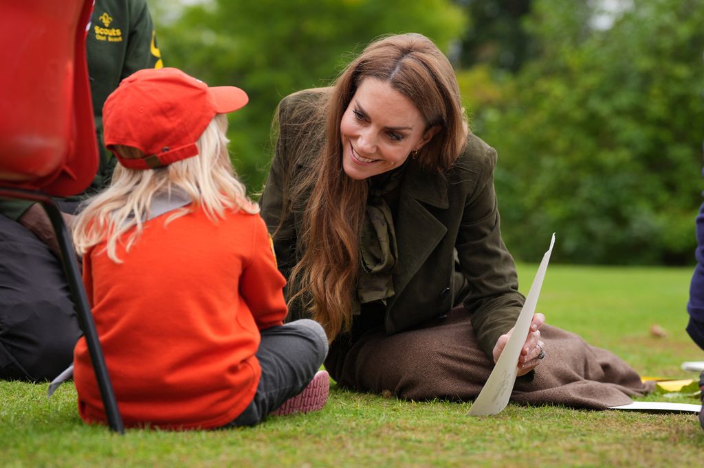 Britain's Catherine, Princess of Wales joins a group of Squirrels from the Scout Association taking part in activities at Frogmore Cottage on the Windsor Estate, in Windsor, on September 18, 2025