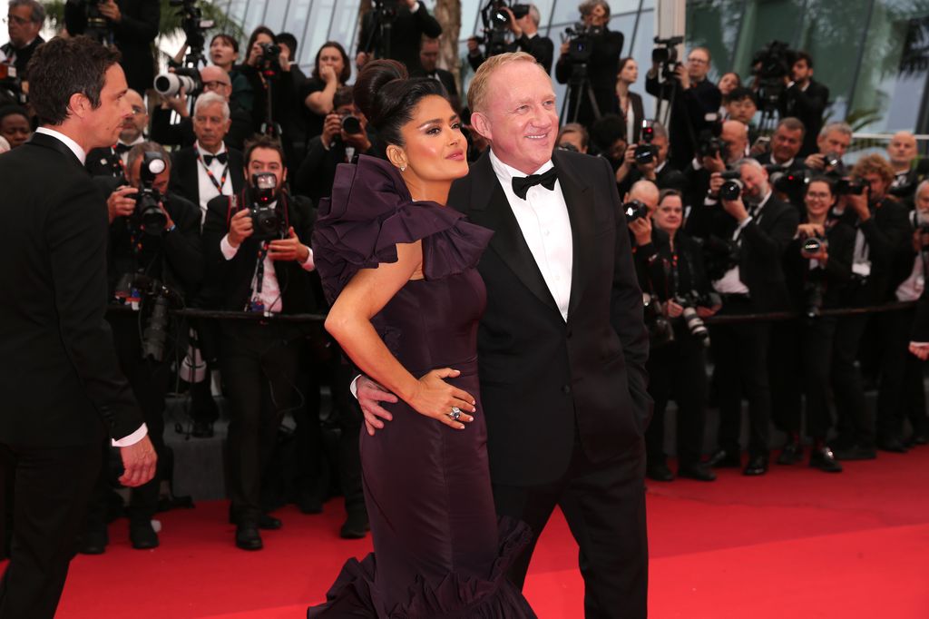 Salma Hayek and François Henri Pinault attend the "Killers Of The Flower Moon" red carpet during the 76th annual Cannes film festival at Palais des Festivals