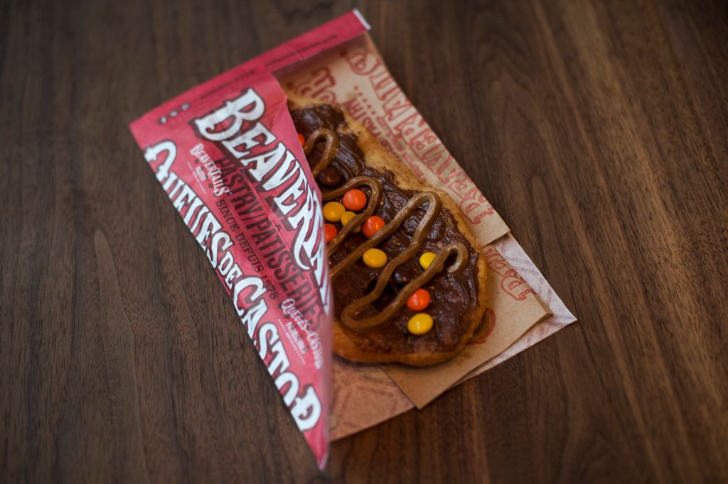The Triple Trip beavertail with chocolate hazelnut, peanut butter and Reese's Pieces is pictured at the newly opened BeaverTails on the waterfront, in Toronto.