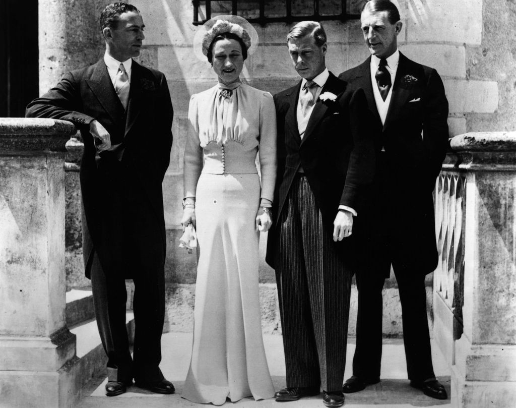 Wallis Simpson and Edward VIII on their wedding day with Herman Rogers and Major Metcalfe by their sides