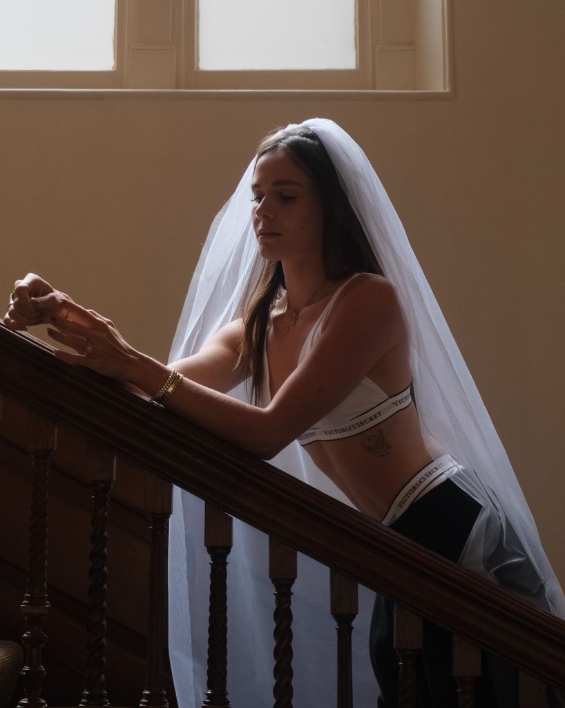 Holly Ramsay weaing a veil and Victoria Secret underwear