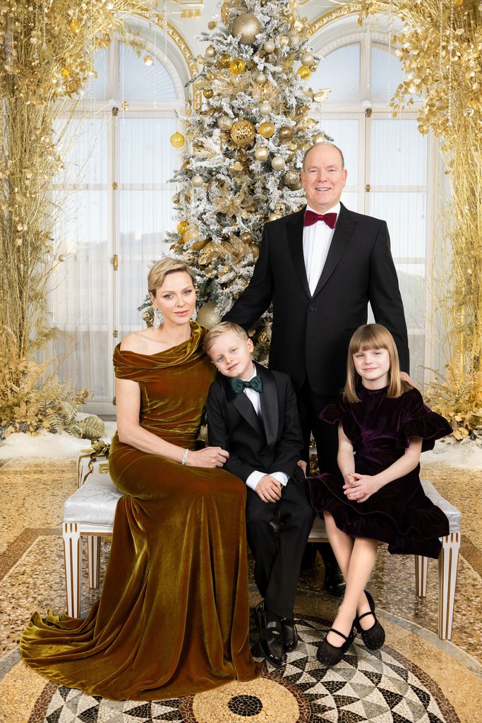 Princess Charlene and Prince Albert pose with their two children, Prince Jacques and Princess Gabriella