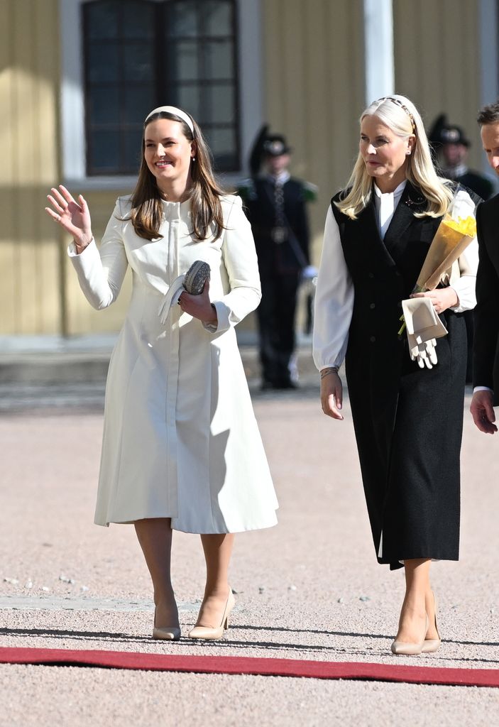 Princess Ingrid Alexandra waves as she attends welcome ceremony at Iceland state visit