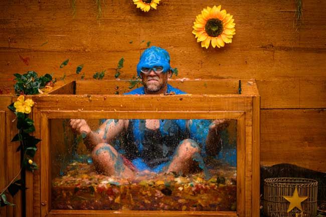 Mike Tindall covered in blue slime during an Im a celebrity trial
