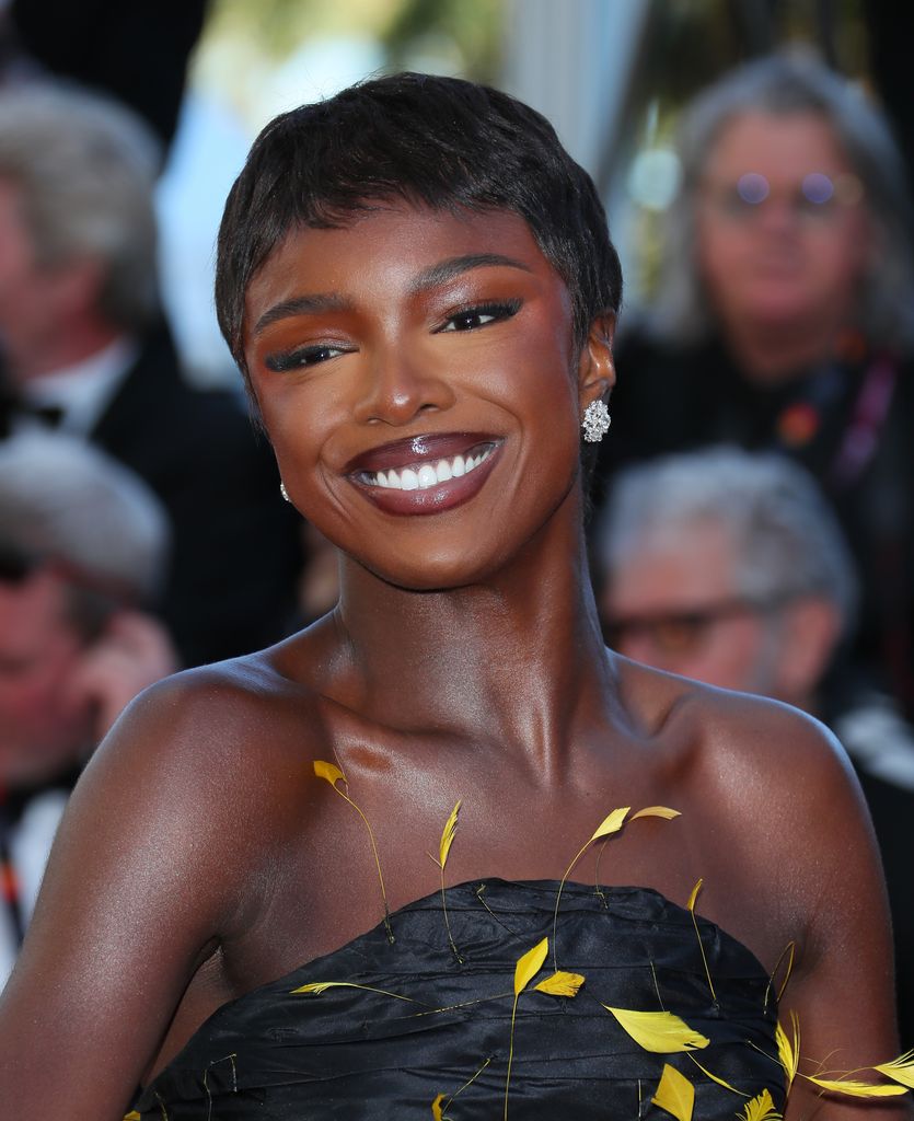 Leomie Anderson glows on the Marcello Mio red carpet with a short pixie haircut and glossy brown lip