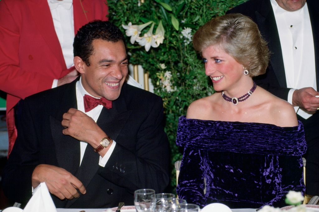 Princess Diana And Bruce Oldfield At A Gala Dinner In Aid Of The Charity Barnado's. She Is Wearing A Crushed Velvet Purple Dress Designed By Him.  